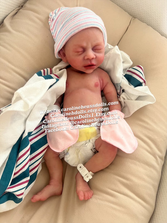 Ready to ship, full body solid silicone preemie River reborn baby girl. Ready for Christmas