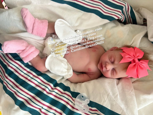 Ready to ship, full body solid silicone preemie River reborn baby girl. Ready for Christmas